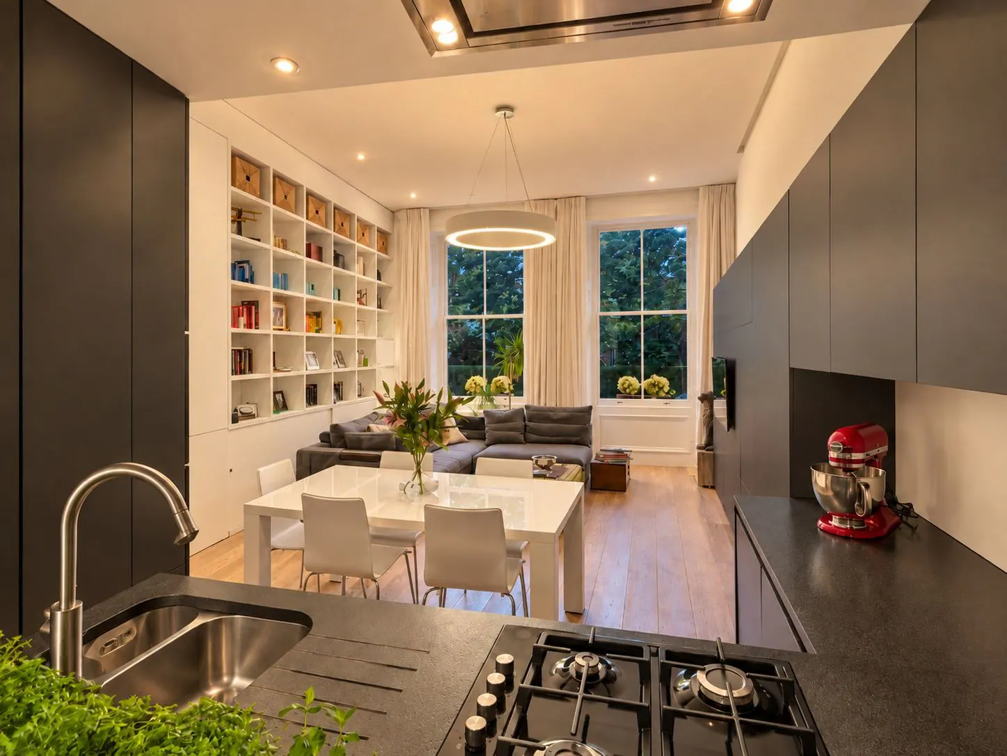 Open-plan living space designed and built by Space Cucina